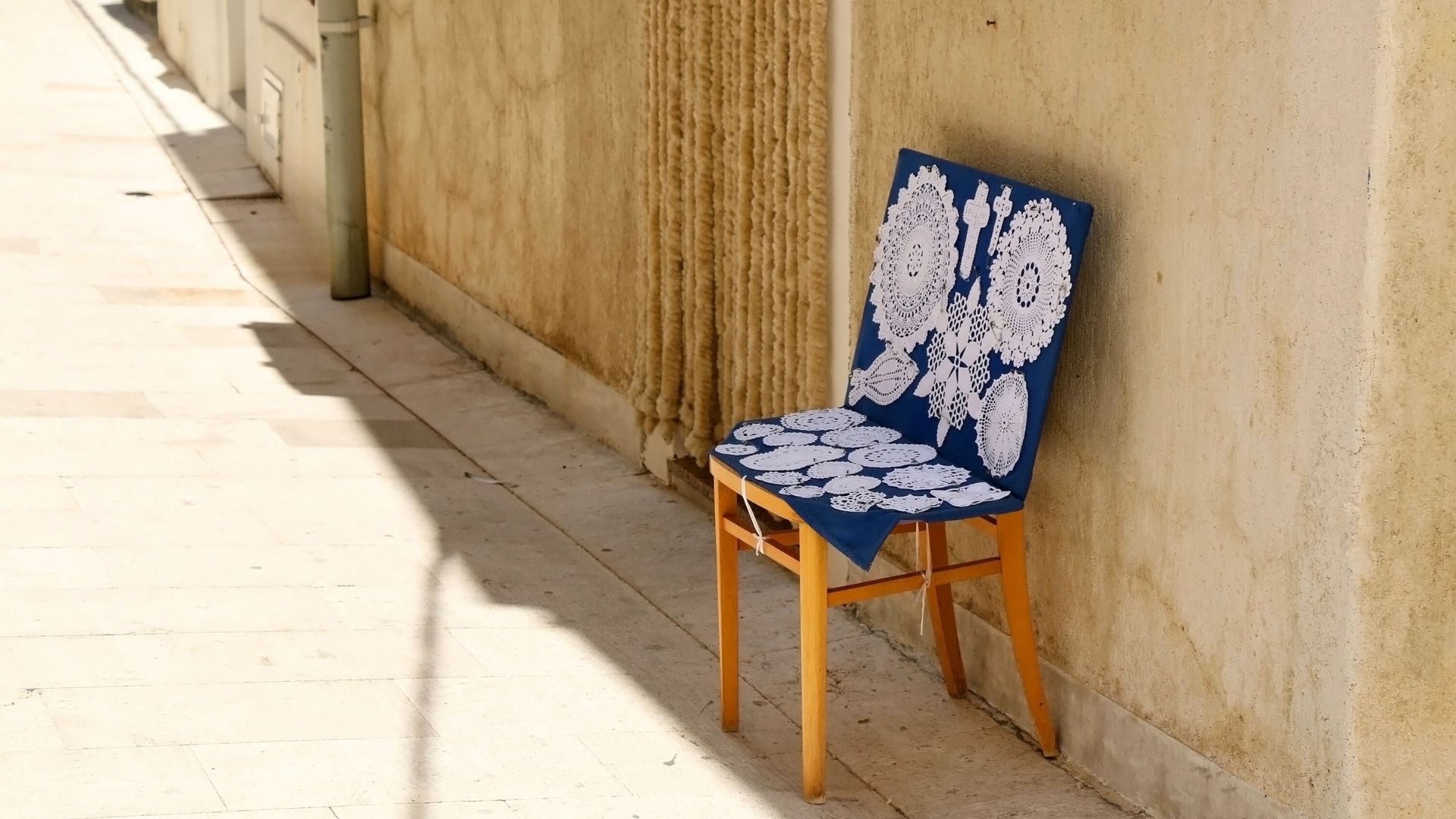 traditional croatian lace art in display on an alley