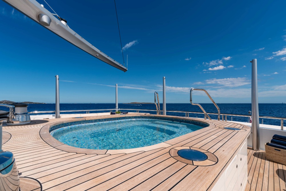 the pool and teak deck of the iyc sailing yacht black pearl