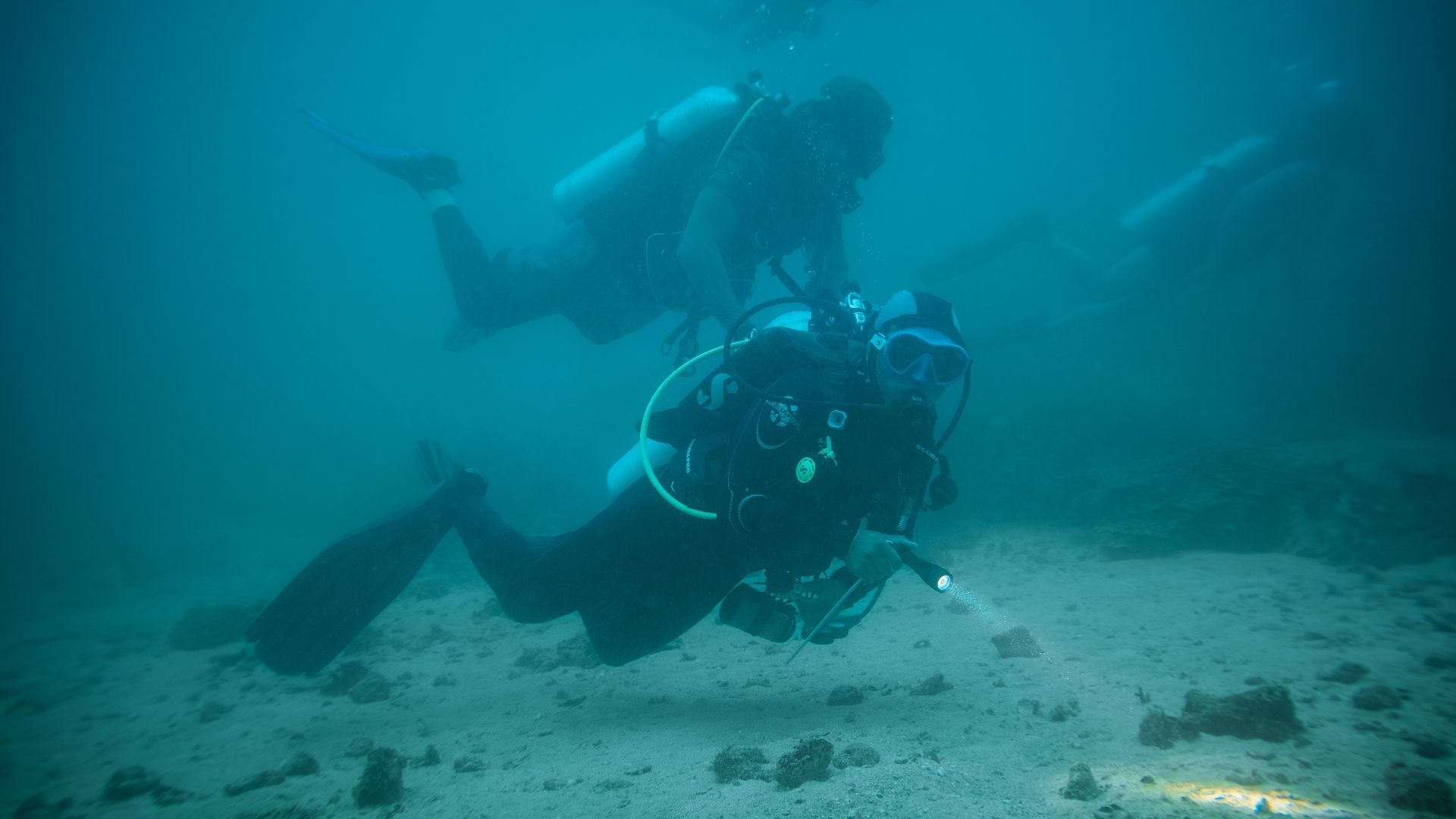 two persons scuba diving in the french polynesia