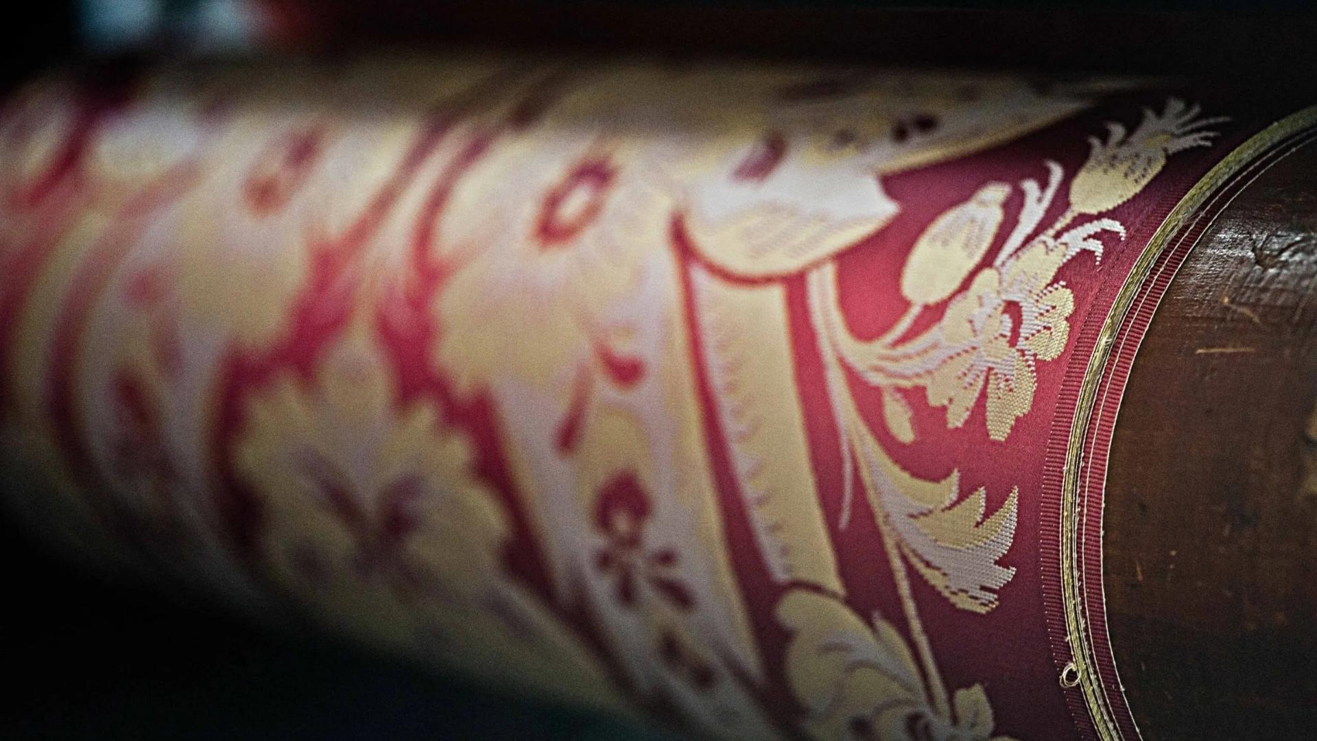 a red and gold damask fabric from lorsica liguria italy