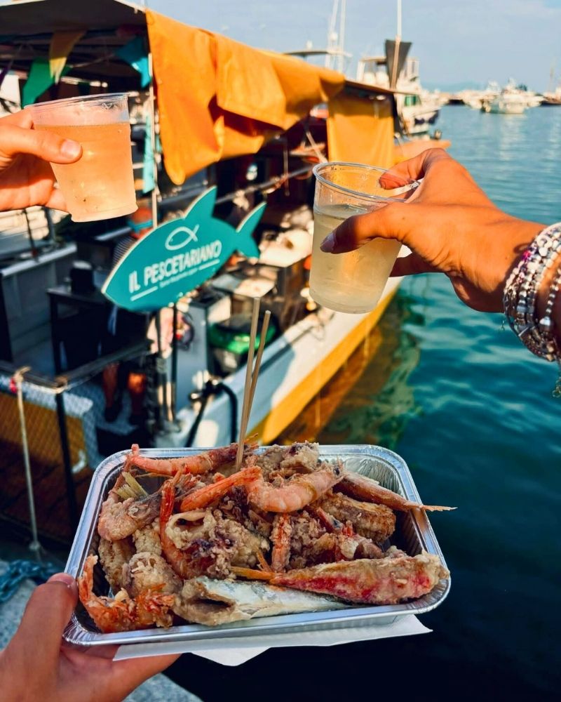 pov of a plate with seafood from il pescatariano in italy