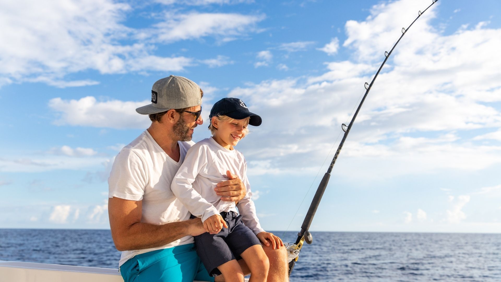 a man and a boy fishing