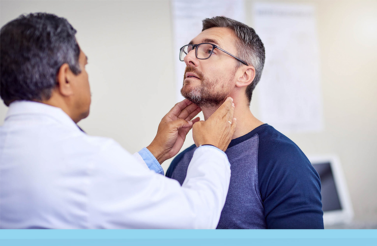 A Doctor at UHealth Jackson Urgent Care examining a patient