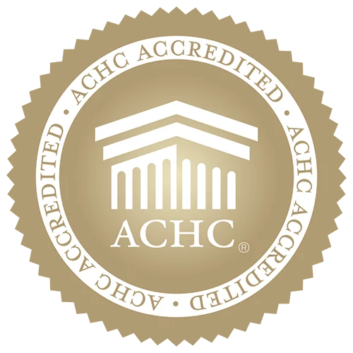 Gold logo that reads ACH