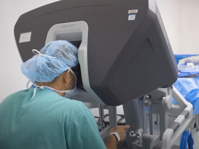 Physician using a Da Vinci machine