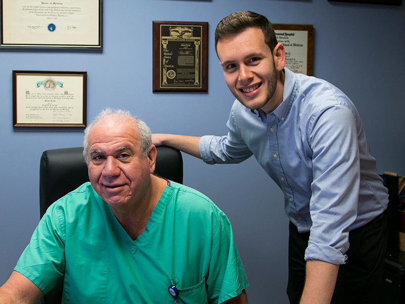 Robert Toledo standing next to his bariatrics surgeon
