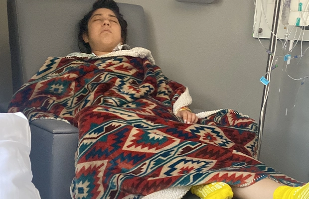 woman lying on a hospital stretcher