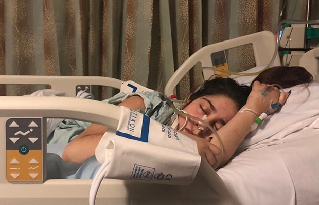 woman lying on a hospital stretcher