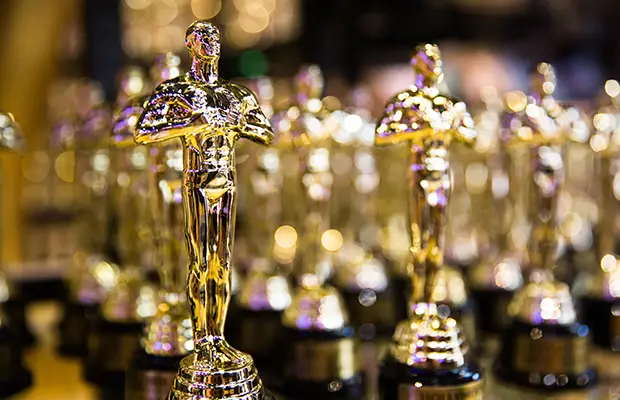 Multiple gold award statues