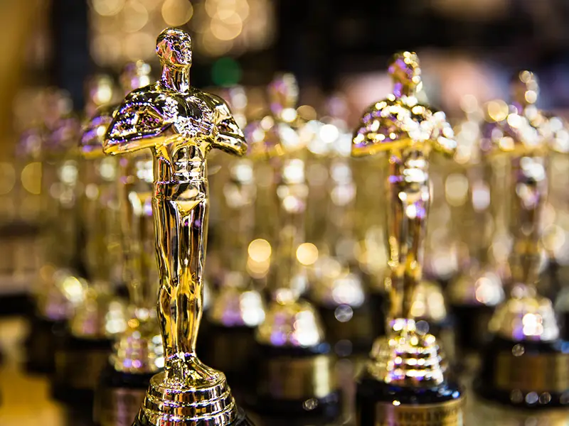 Multiple gold award statues