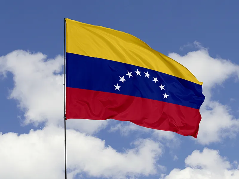 Venezuela flag with clouds in the background