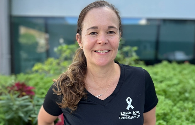 close-up of a woman in a black t-shirt