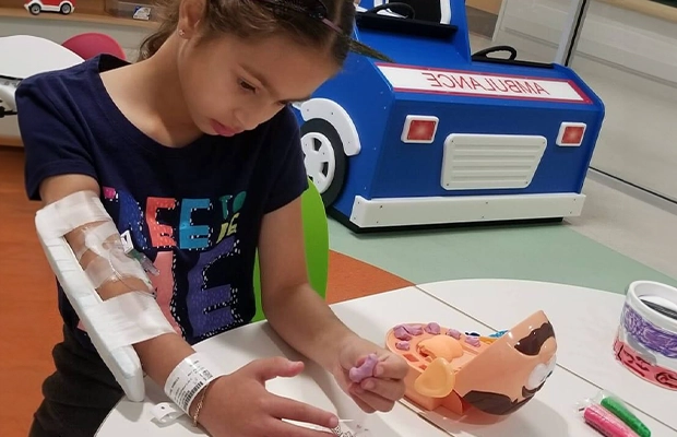 girl playing in the hospital