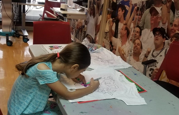 girl painting in the hospital