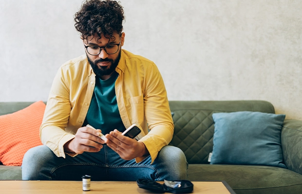 Man sitting on his living room