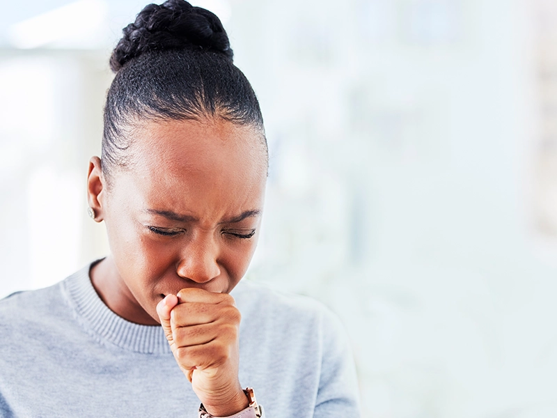 woman coughing