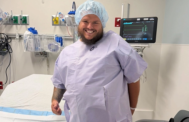 man wearing surgical scrubs