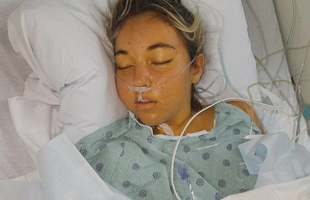 Woman lying on a hospital gurney