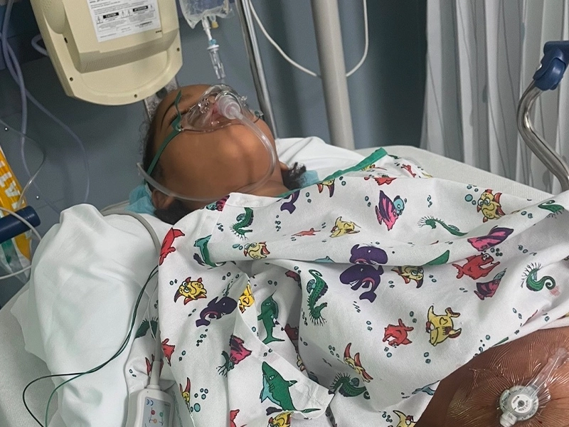 woman intubated in a hospital bed