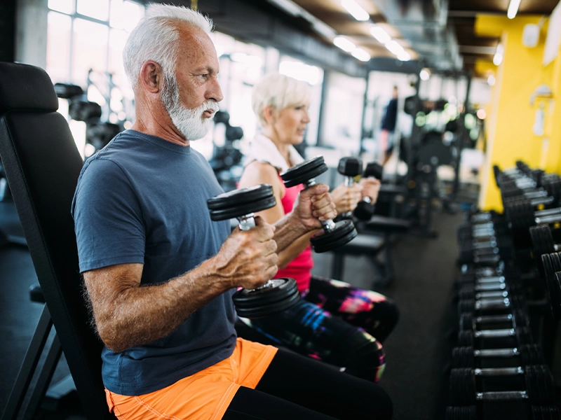 Adult man exercising in the gym