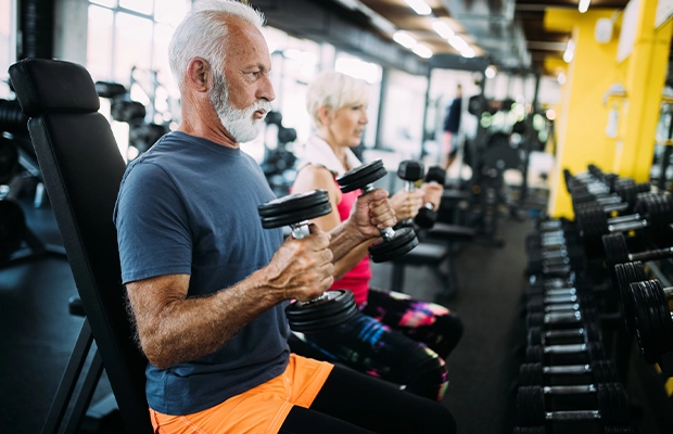 Adult man exercising in the gym