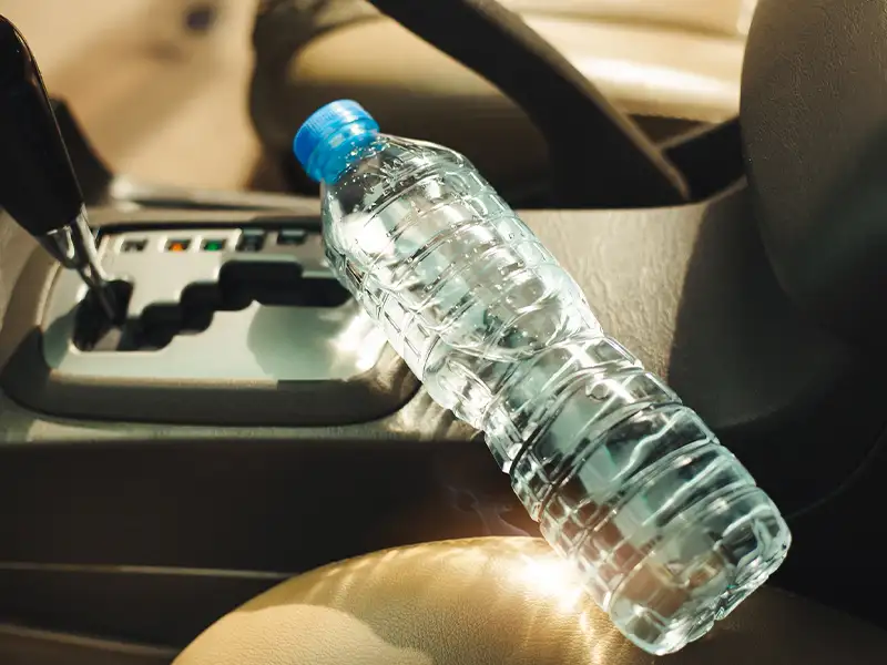 bottle of water inside a car