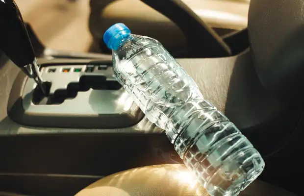 bottle of water inside a car