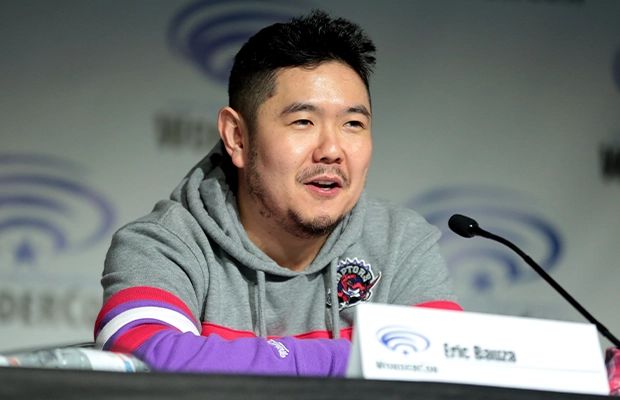 photograph of Eric Bauza during a press conference
