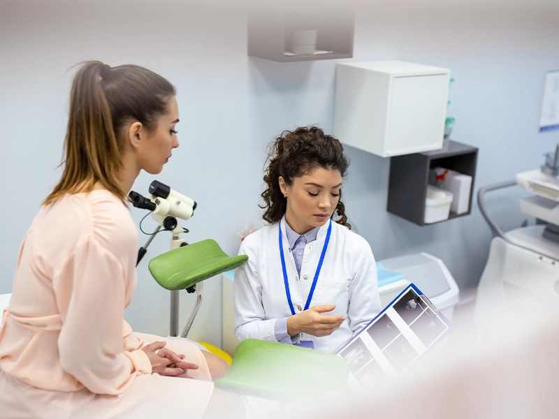 Doctor showing results to a patient in her office