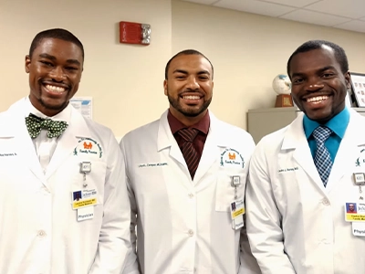 three doctors posing for the camera