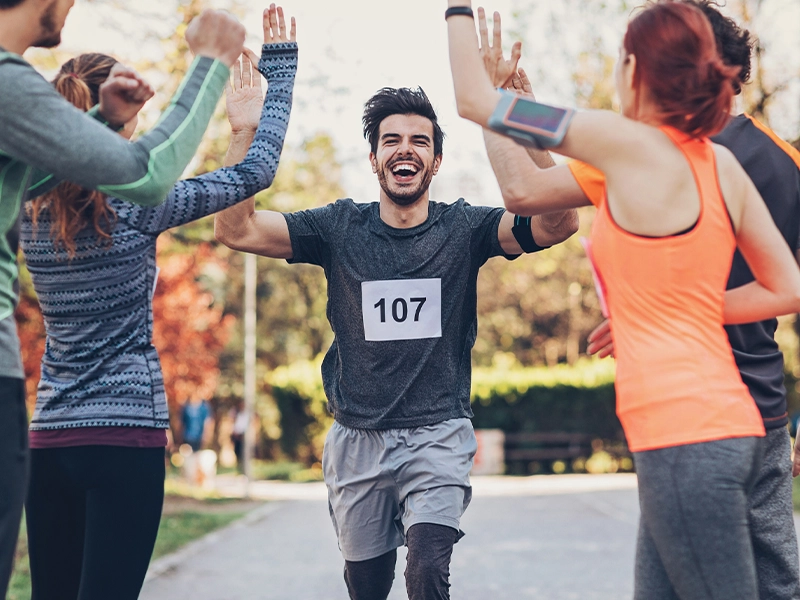 happy man finishing marathon