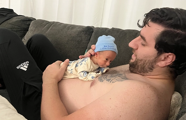 Dad holding his little baby