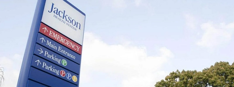 An image of a sign that reads Jackson Health System