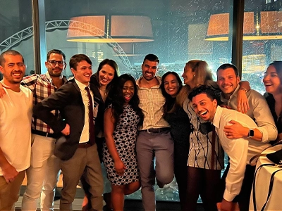 group of people posing and smiling at the camera