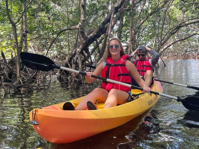 two women kayaking