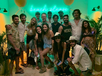 group of people posing and smiling at the camera