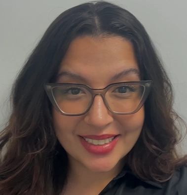 Close up of a women with a black t shirt and glasses