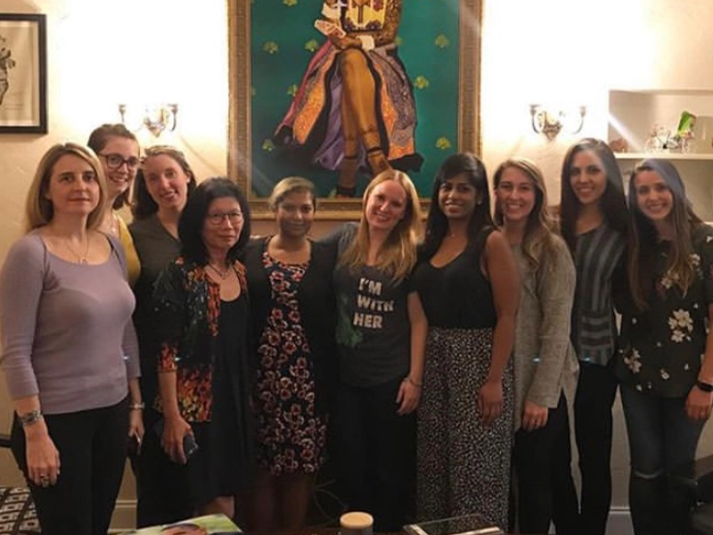 Group of women posing and smiling at the camera