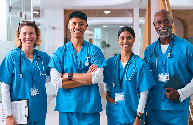group of doctors dressed in blue