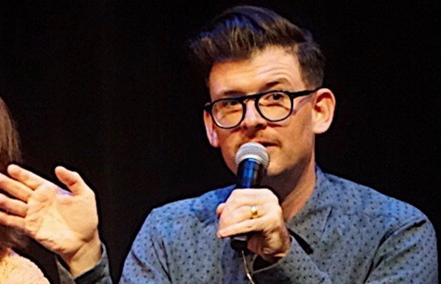 picture of Moshe Kasher on a conference