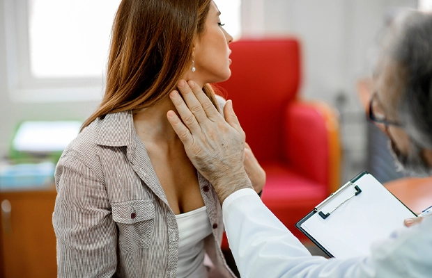 A woman being examined by her doctor.