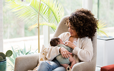 mom breastfeeding her son
