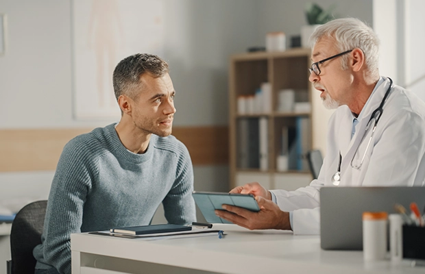 man talking to his doctor