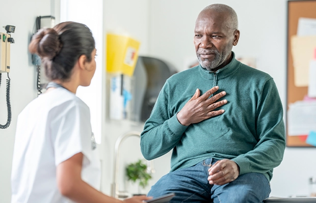 Adult man being examined by his doctor
