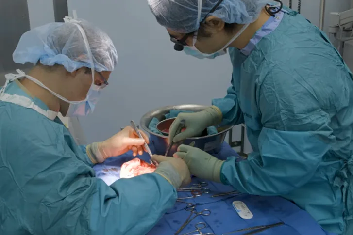 Medical professionals performing a surgery