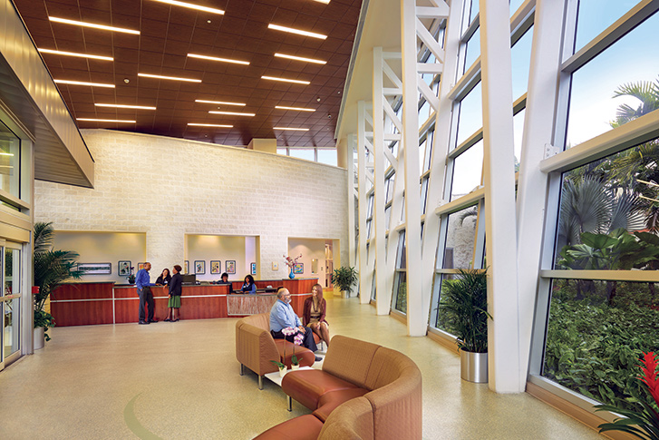 Interior of lobby of Jackson South, with two people sitting on a couch