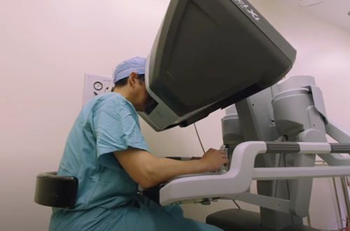 Doctor using robotic surgery machine.