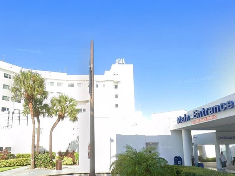 Daytime photograph of a white building