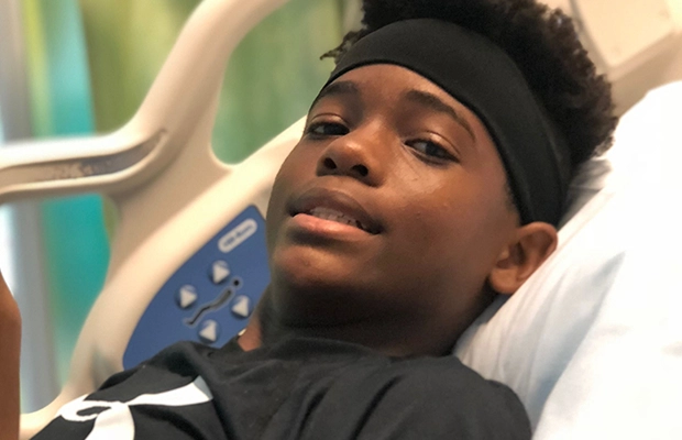 young boy on a hospital gurney