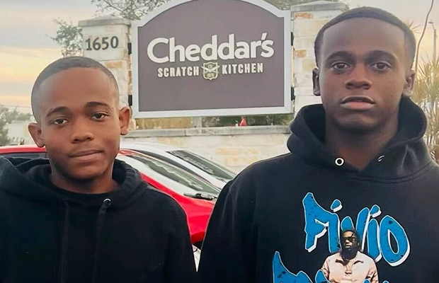 photograph of two teenagers
